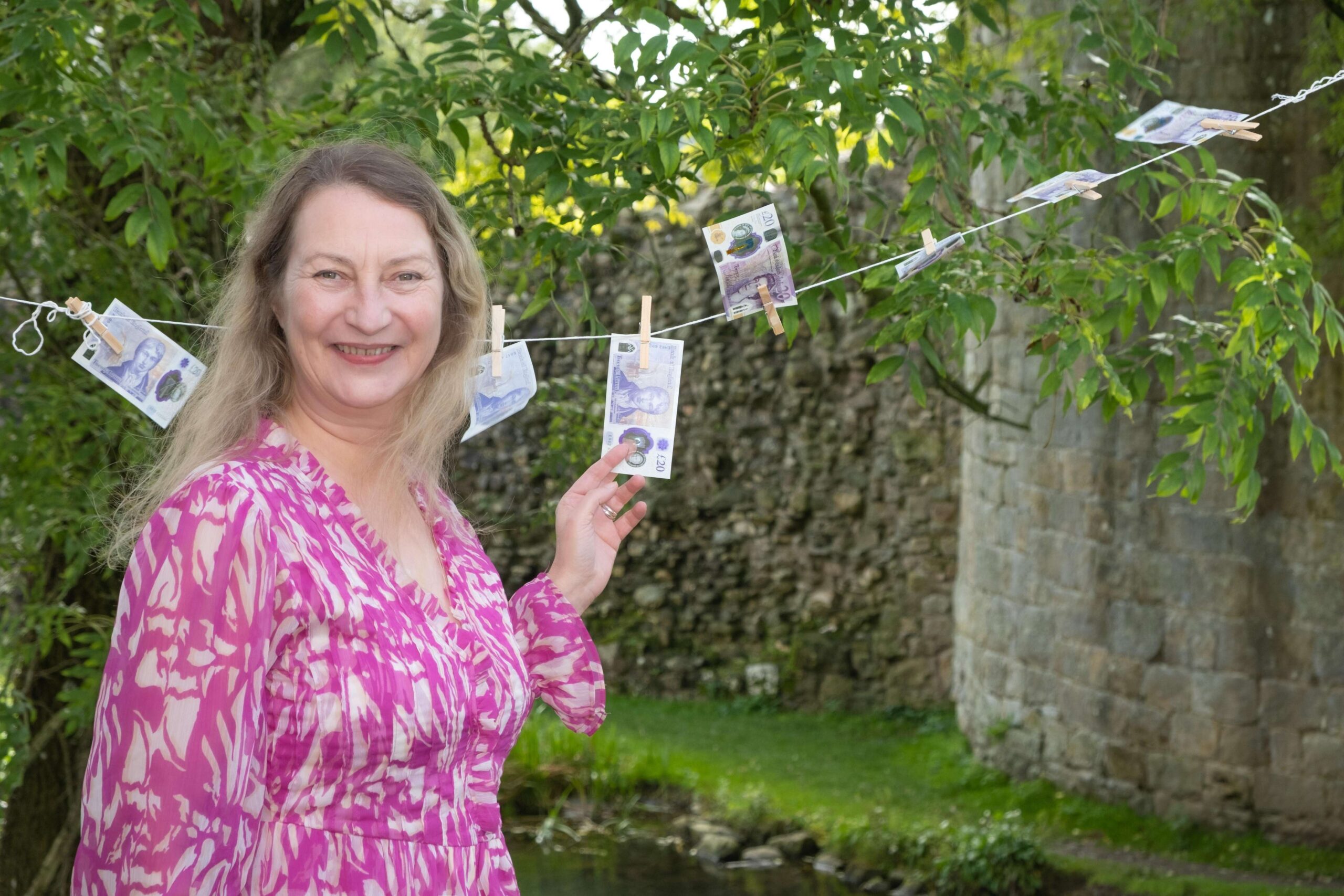 Jenny Bracelin, Business Coach laundering her money and pegging it out on a clothes line in Shropshire